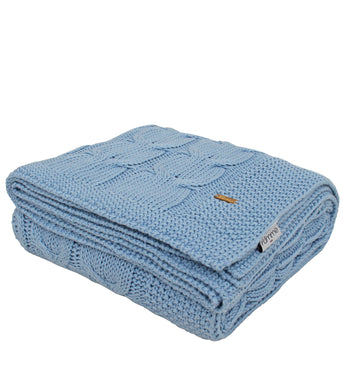 Knitted blue cable texture throw